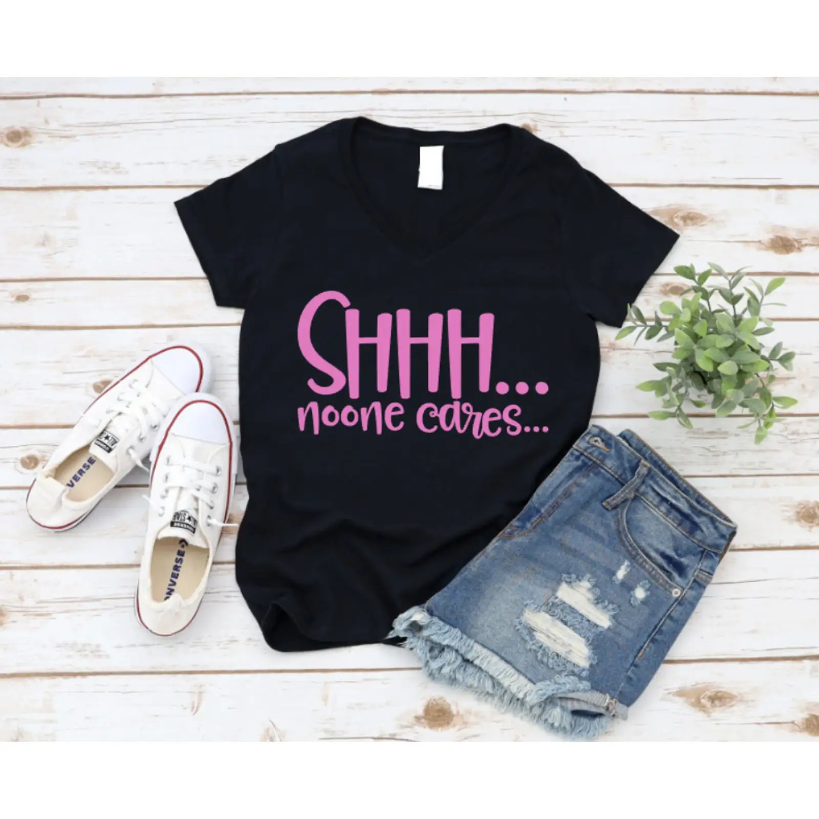 Zwart t-shirt met roze tekst ' - On Sneaker Care recensie en prijs